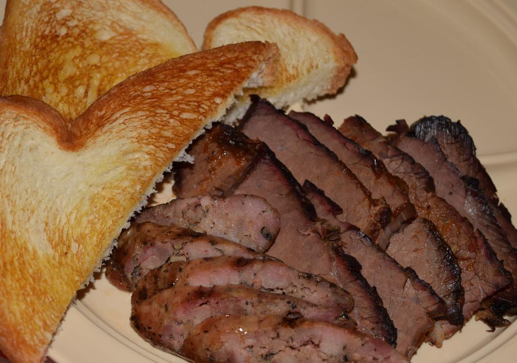 Combo Brisket Plate (Two Meats) · 1/4 pound brisket & 1/4 pound other boneless meat. It's served with two sides, bread and sauce on the side. Pickles and onions upon request.