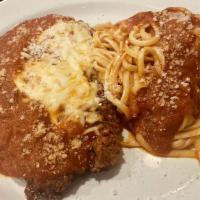 Amanda'S Chicken Parmagiano  · Lightly breaded and pan-seared, topped with a rich tomato sauce, parmesan cheese and spaghet...
