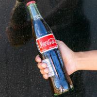 Coke · Half liter Coke.