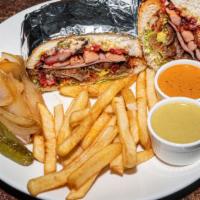 Torta Cubana & Fries · Traditional Mexican Sandwich With 4 Kinds Of Meat Ham, Salchicha, Milaneza and Trompo Served...