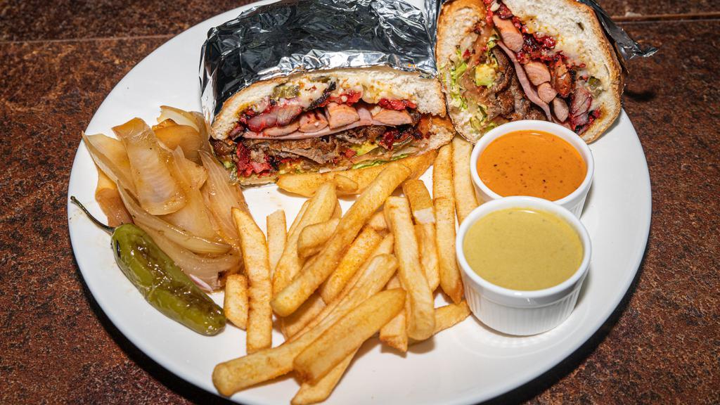 Torta Cubana & Fries · Traditional Mexican Sandwich With 4 Kinds Of Meat Ham, Salchicha, Milaneza and Trompo Served With Fries