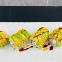 Dragon Roll · Raw. Eel and cucumber inside avocado and masago on top with eel sauce.