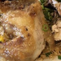 Roasted Chicken With Steam Rice · Whole chicken roasted in our house special sauce. Served with green onion, and cilantro. A f...