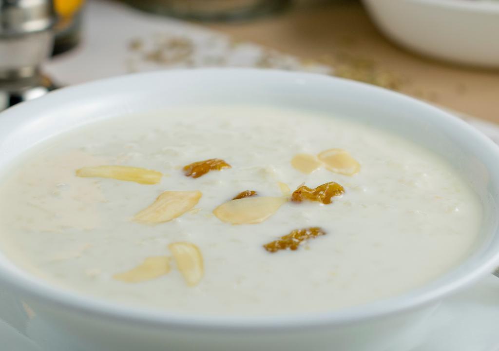 Kheer Badami · Traditional Indian rice pudding made with raisins and nuts.