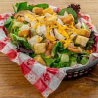 Byo Garden Salad · Garden salad with tomatoes, cheddar cheese and croutons. You may also add up to 5 pizza topp...