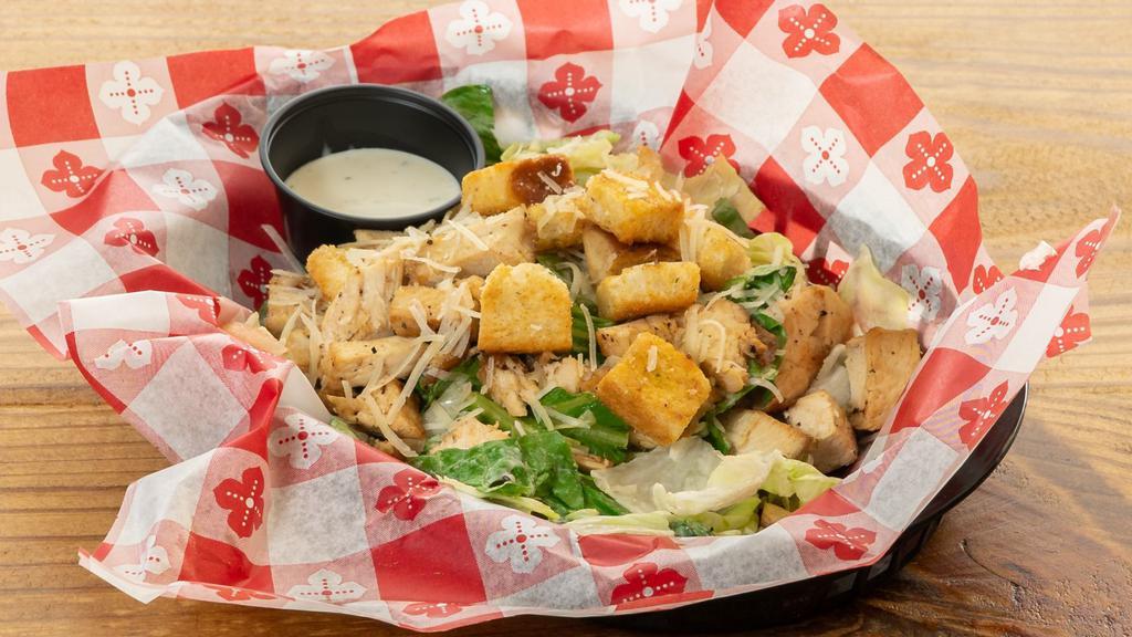 Byo Caesar Salad · Romaine lettuce with shredded parmesan, seasoned croutons and Caesar dressing. You may also add up to 5 pizza toppings.