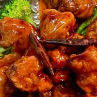 Spicy General  Chicken 🌶  · Fried chicken batter with steam broccoli and carrot in spicy brown sauce