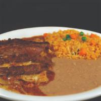 Enchilada Parrillada · Two cheese enchiladas topped with chile con carne and beef or chicken fajita served with ric...