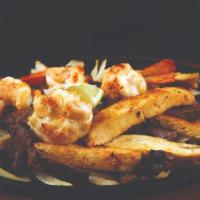 Trio Beef, Chicken & Shrimp · Grilled shrimp, beef and chicken fajita combo.