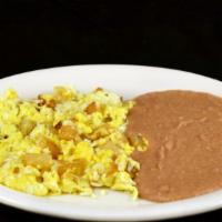 Papas Con Huevo · SCRAMBLED EGGS WITH DICED POTATOES  SERVED WITH BEANS