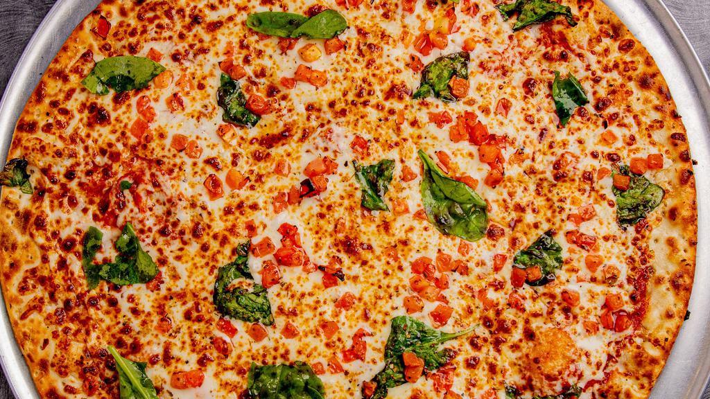 Margherita · A Slice of Italy! Right at Home! Our Margherita Pizza is topped with 100% Whole Milk Mozzarella Cheese, Fresh Basil, Freshly Diced Red Tomatoes, Ken's Simply Vinaigrette Olive Oil & Vinegar Dressing, and Original Tomato Pizza Sauce.