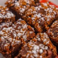 Brownie Bites · Bites that Feel Just Right! Our Brownie Bites are made with Pure Melted Chocolate and loaded...