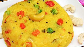 Rava Kichadi · Roasted sooji cooked with onion, tomato, carrot, green chillies, and green peas sautéed and ...