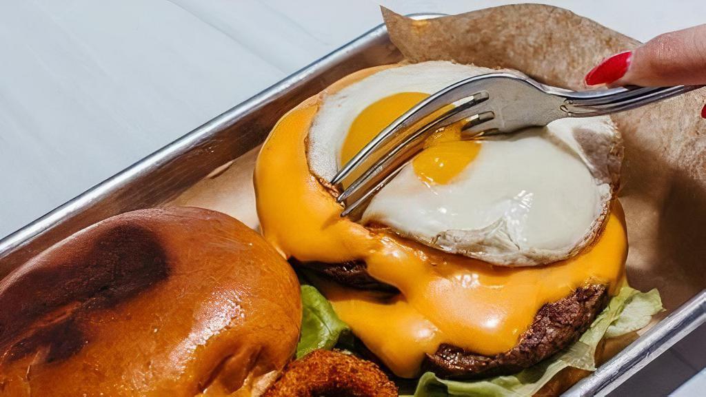Moody'S Special Burger · Double Creek Stone Farms Black Angus Patty, Cheddar Cheese, Crispy Onions, Egg, Arugula, Garlic Aioli
