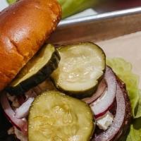 Impossible Burger · Impossible Meat Patty, Lettuce, Tomato, Onion, Pickles, Garlic Aioli.