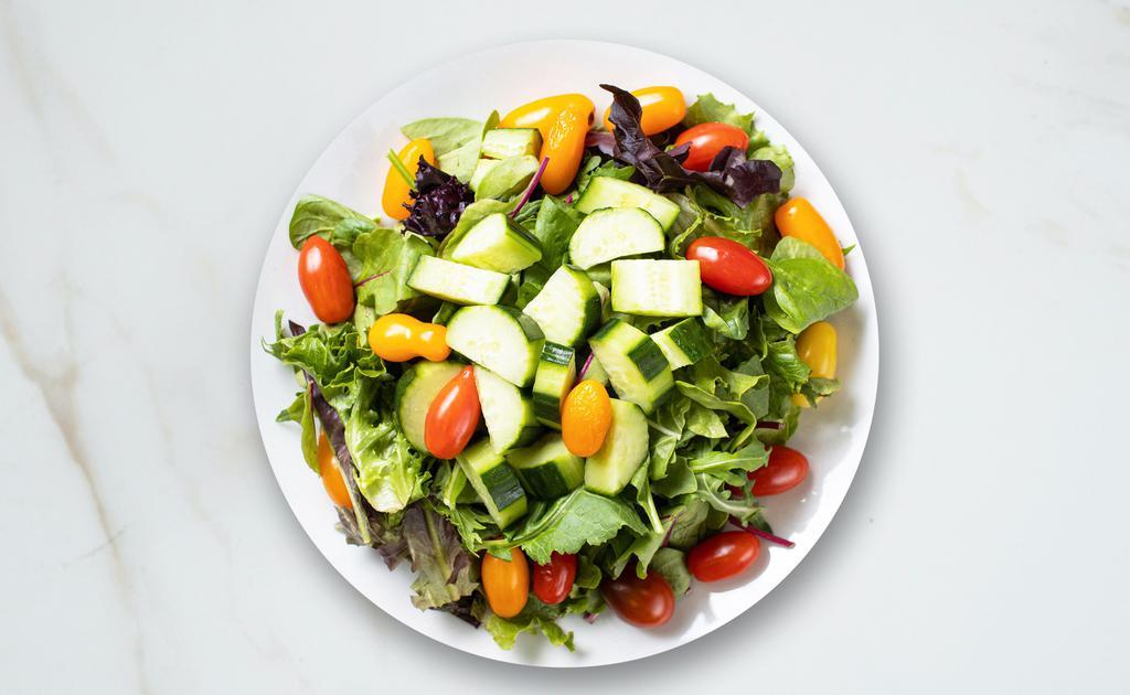 House Co. Salad · Lettuce, cherry tomatoes, carrots, onions dressed with lemon juice & olive oil