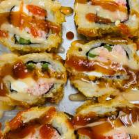 Hot Girl Roll · Deep-fried roll, snow crab, cream cheese and jalapeño inside. Topped with spicy mayo sauce, ...