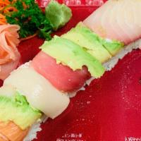 Rainbow Roll · California roll inside topped with tuna, salmon, white fish and avocado.