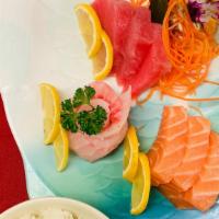 9 Pieces Sashimi & Steam Rice · 