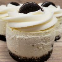 Cookies N' Cream · Creamy vanilla cheesecake with pieces of Oreo inside,  topped with our vanilla buttercream; ...