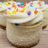 Birthday Cake · Our birthday cake cheesecake has a cake batter flavor, filled with colorful sprinkles, toppe...