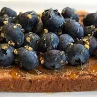 Almond Butter Toast · Blueberry, honey, and bee pollen on multigrain toast.