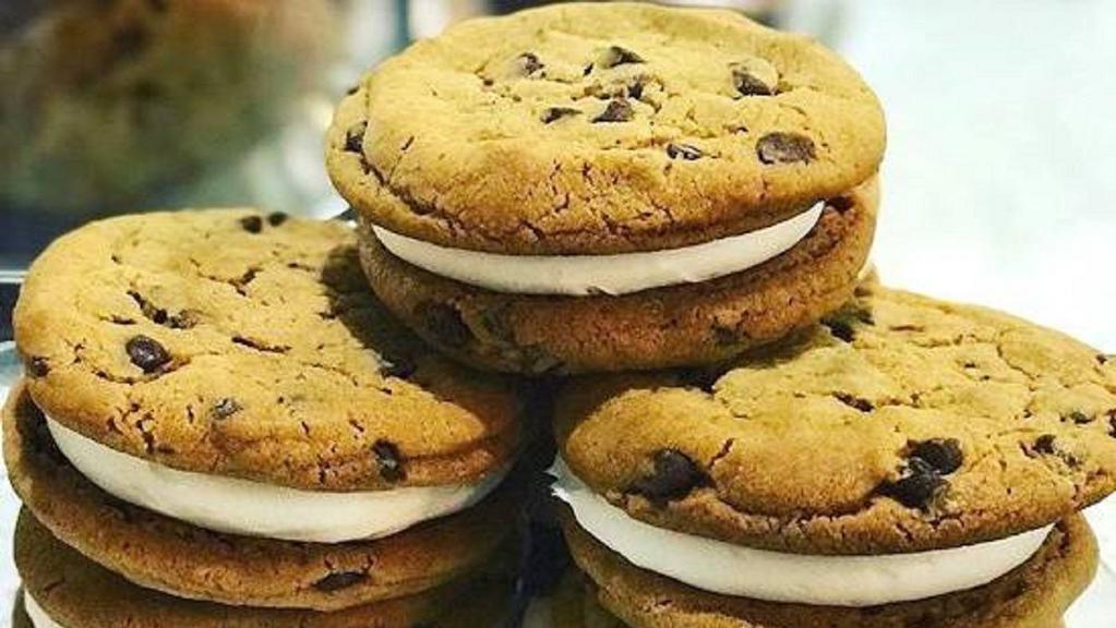 Cookie Sandwich · Made with your choice of cookies: chocolate chip, sugar, red velvet, macadamia nut, oatmeal raisin or peanut butter. Please indicate cookie flavors.