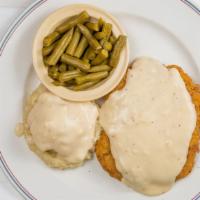 Chicken Fried Steak · Our Chicken fried steak and served with your choice of two sides.
