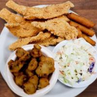 Friday'S Only Fried Catfish · Four fillets of fried catfish with hush puppies and your choice of two vegetable sides.