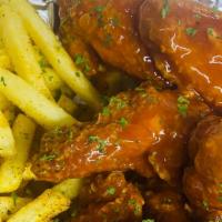 Fried Chicken Wings · 8 wings Comes with side fries.
Choice of flavors: BBQ, Buffalo, , Sweet chili, Garlic Parm, ...