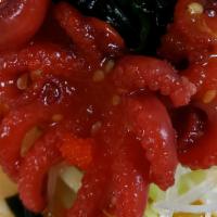 Baby Tako Salad · Baby octopus over cucumber & daikon. Topped w/ seaweed, masago, sesame seeds & sunomono sauce.