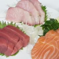 Sashimi Sampler · 3 tuna, 3 salmon & 3 yellow tail.