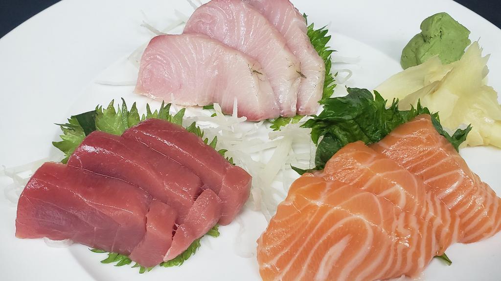 Sashimi Sampler · 3 tuna, 3 salmon & 3 yellow tail.