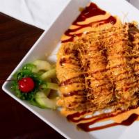 Swirling Shrimp · 4 fried filo dough wrapped shrimp. Topped w/ spicy mayo, eel sauce & sesame seeds.