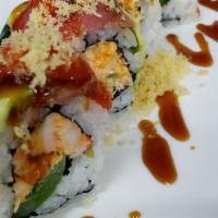 Fuji Roll · Shrimp salad & jalapeno. Topped w/ pepper tuna, avocado, sriracha, eel sauce & tempura flakes.