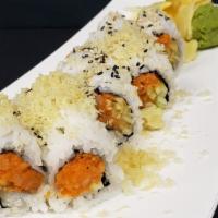 Dynamite Roll · Sriracha chopped tuna, salmon, yellowtail, cucumber & rolled in tempura flakes.