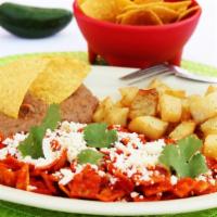 Chilaquiles · Green or red. Corn chips with salsa, queso fresco, potatoes, and beans.