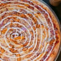 Buffalo Chicken Ranch · Spicy chicken, red onions, and Wisconsin mozzarella, with spicy hot sauce, Russo's pizza sau...