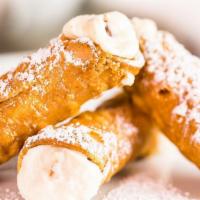 Italian Cannoli · An Italian handcrafted pastry shell filled with fresh ricotta cheese and chocolate.