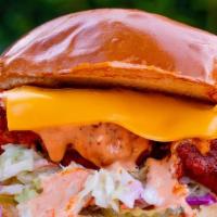The Social Chick · Toasted bun, fried chicken breast, slaw, pickles, comeback sauce.