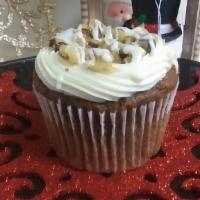 Carrot Cupcake · Carrot Cupcake , cream cheese icing topped with walnuts