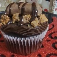 Butterfinger  Cupcake · Chocolate cupcake topped with Butterfinger candy bar. Chopped butterfinger pieces, drizzled ...