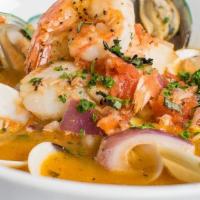 Cioppino Soup · New Zealand green-lipped mussels, clams,  George Bank scallops, salmon, jumbo shrimp,  and v...