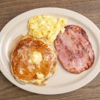 Hot Cakes Or French Toast With One Egg · With ham, bacon, or sausage and one egg cooked your style.