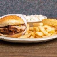 Pig Sandwich · Tender sliced BBQ pork served on a bun with relish and special sauce.