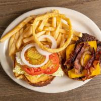Bacon Cheeseburger Combo · 1/4 lb 100% ground beef patty with bacon and cheese-- choose your own fixings!
Ketchup, Mayo...