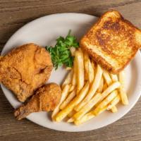 Picnic Chicken · Three pieces of fresh fried bone-in chicken served with golden fries and Texas toast.