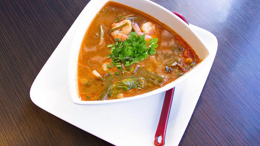 Tom Yum · A tasty, spicy combination of herbs, mushrooms, tomatoes,
cilantros, lemongrass, galangal roots, and chili