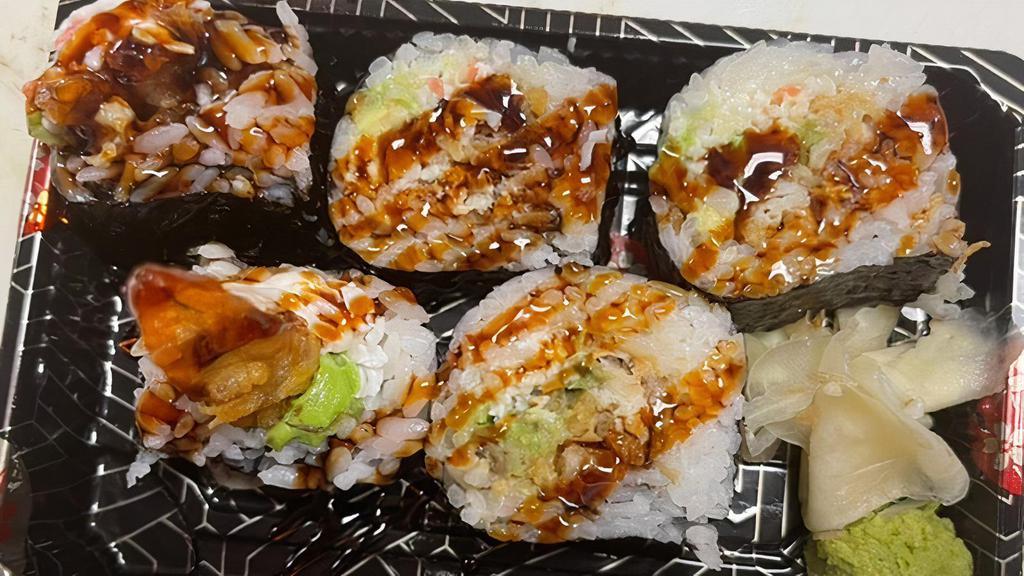 Spider Roll · Inside soft shell crab,crab meat,and avocado,topped eel sauce