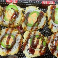 Fire Cracker Roll · Spicy. Deep fried crab meat and cream cheese topped with jalapeño, eel sauce and spicy mayo.